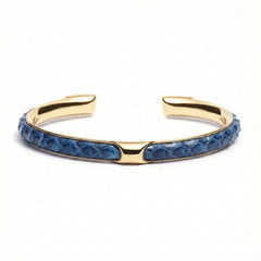 Infinity Gold Python Blue cuff bracelet in genuine deep blue python leather on a gold-tone 316L steel frame
