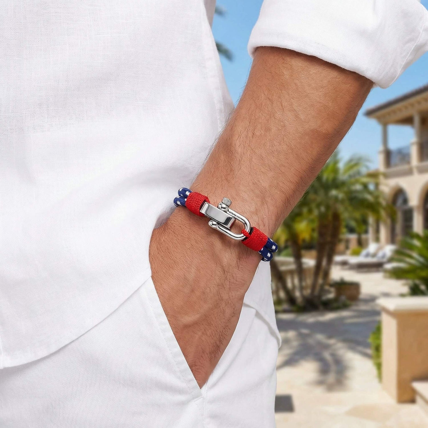 Silver plated 316L stainless steel adjustable D-shackle close-up on Binate Blue Dotted bracelet
