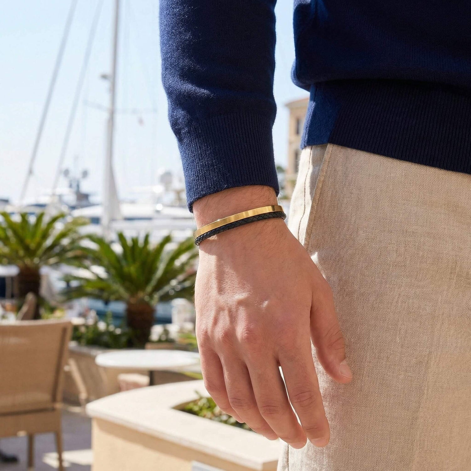 Eros Golden flat lay on dark surface showing full bracelet shape
