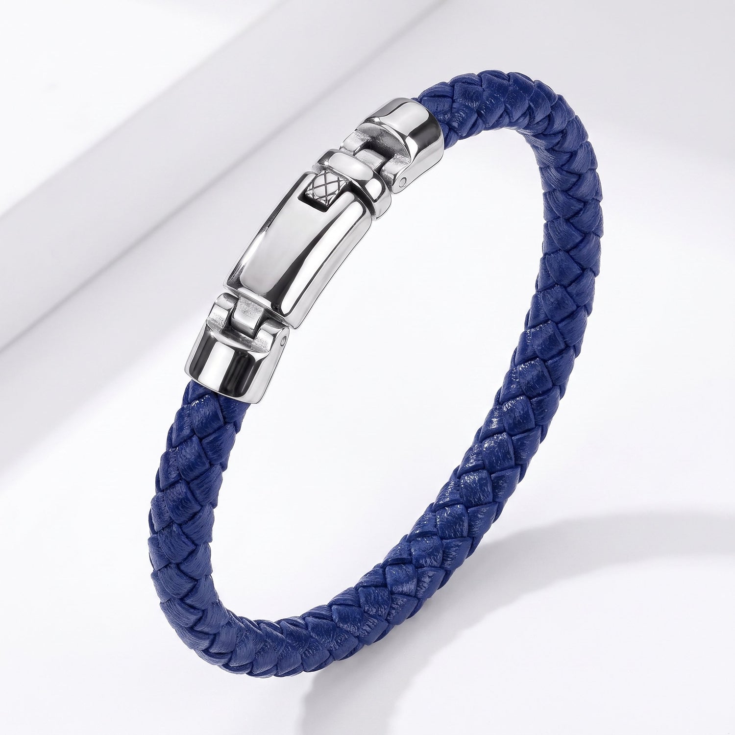 Legacy Navy Blue braided leather bracelet shown from several angles, with a close view of the woven leather strands