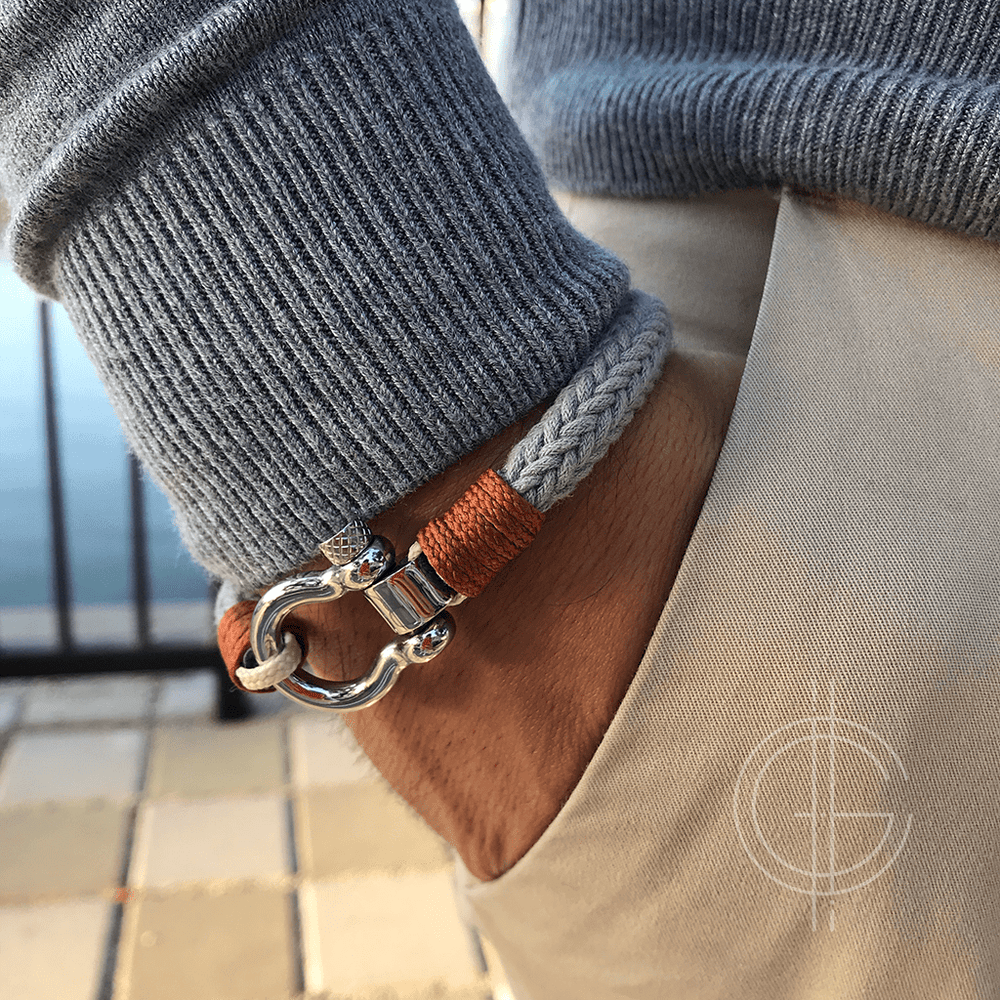 Omega Grey cotton bracelet on wrist mens style daily wear bestseller Caligio